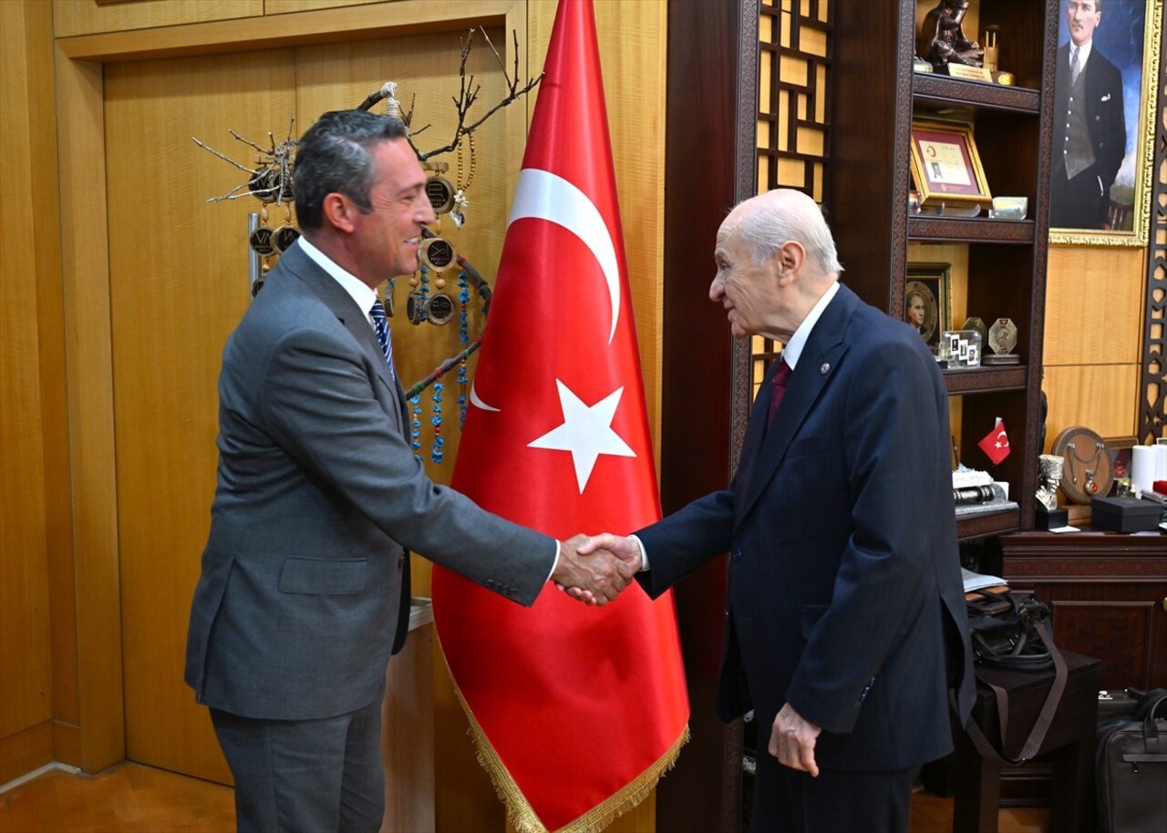 MHP Genel Başkanı Devlet Bahçeli (sağda), Fenerbahçe Spor Kulübü Başkanı Ali Koç (solda) ile...