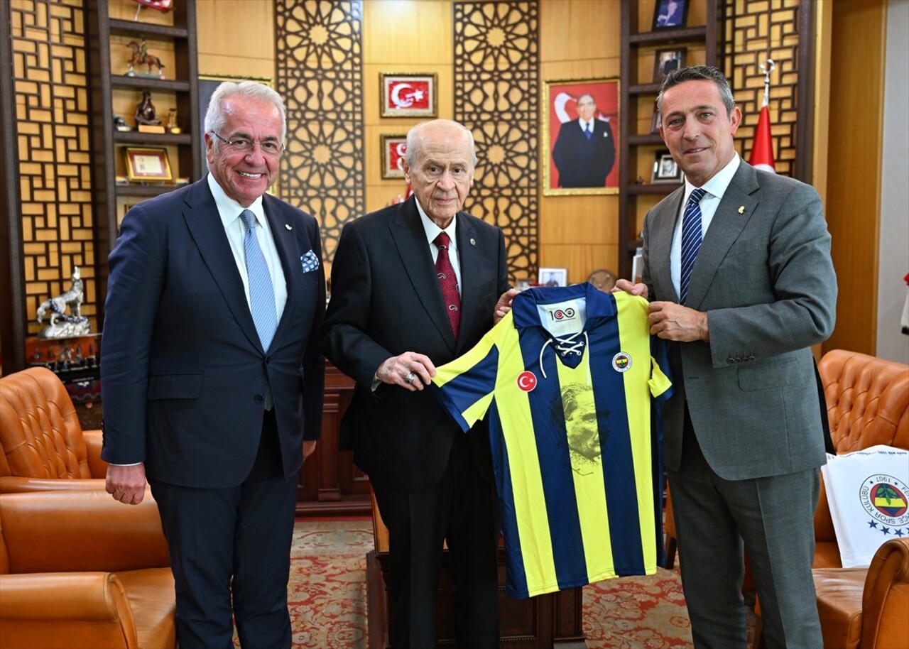 MHP Genel Başkanı Devlet Bahçeli (sağda), Fenerbahçe Spor Kulübü Başkanı Ali Koç (solda) ile...